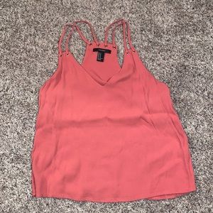 Coral top, in good condition, size M
